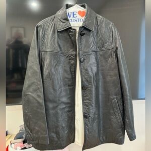 Vintage distressed leather jacket with red trim